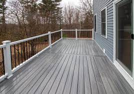 Blue house with stained deck. 7 Best Deck Colors For Grey House That You Must Choose Jimenezphoto