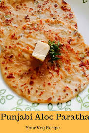 Punjabi Aloo Paratha Is A Popular And Staple North Indian Food Indian Flatbread Stuffed With Mashed Potatoes And Some Sp Paratha Recipes Tiffin Recipe Paratha