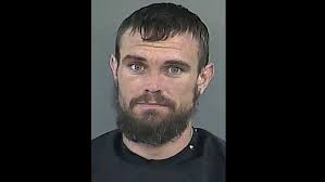 Man arrested, caught with pipe bomb at apartment complex, police say