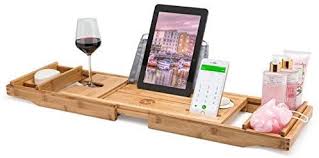 We could actually read a book without using the bathtub caddy with reading rack but very risky against a security book in hand we are tired of it. Amazon Com Morvat Bamboo Bathtub Tray Bath Caddy Bath Shelf Bath Table Bathtub Accessories Bath Tray For Tu Bathtub Shelf Bathtub Tray Bathtub Caddy Tray