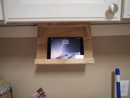 This unconventional approach offers a level of convenience and. Diy Ipad Holder Under Kitchen Cabinet Keeps Online Recipes Closeby
