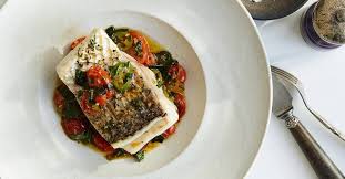 Ease Into Spring With This Light Quick Cooking Recipe For Black Bass Quick Cooking Recipes Cherry Tomato Sauce Recipes