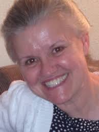 Flood-wary community repairs and prepares