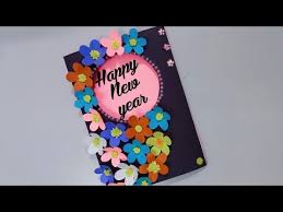 Make your own card out of cardstock or use an online resource to create a custom card. Video Happy New Year Card