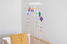 I hung a variety of birds from the inside of the lampshade and added some moss to. How To Make A Kite Mobile For A Nursery Or Child S Bedroom Hgtv