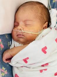 hello all! this is my beautiful one month old Esra June. we have not left  the hospital since she was born. it started in my pregnancy i had a 2VC  which made