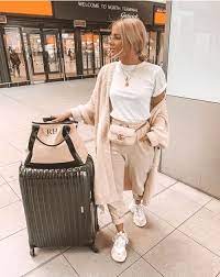 Traveling Style In Winter Cozy Coats Airplane Outfits Comfy Travel Outfit Comfy Airport Outfit