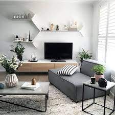Come Arredare Una Parete Bianca E Noiosa Senza Impazzire Salotti Scandinavi Idee Di Interior Design Soggiorno Soggiorno Moderno