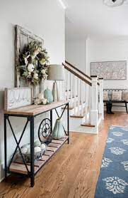 The entry table needs to be similar to the complete theme of your home so it can be stained according to your this idea for the table ensures that there is enough space as it has two racks for storage. Layer A Fall Wreath On A Window Pane For A Unique Seasonal Entryway Look Unique Home Decor Entryway Table Decor Entryway Decor
