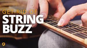 You can check to see if they are level with a straightedge. How To Fix Annoying String Buzz On Your Guitar Youtube