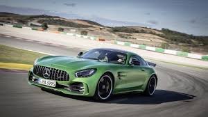 Mercedes Benz Pulls A Porsche With Top 5 Fastest Cars Video Mercedes Amg Gt R Mercedes Amg Mercedes Benz Amg