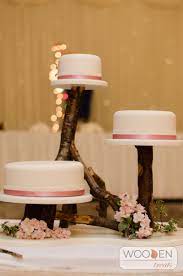 Handmade Weddings With A Truly Unique Style Rustic Wedding Cake Stand Wedding Cake Stands Cupcake Stand Wedding
