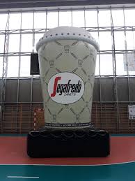 Tall, vertical bookcases are practical for storing and they draw the eye up, too. Inflatable Coffee Mug For Roof Advertising Inflatable Advertising