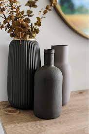 Pour a few tablespoons of paint inside your jar and start moving the paint around inside the jar….carefully and ideally over a trash can or a drop cloth just in case any. How To Paint A Vase Ways To Update Cheap Glass Vases
