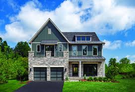 Vinyl And Stone Siding Make A Dazzling Combination For Your Home S Exterior Pictured Above Retreat At Mclean Mehr F Luxury Homes Model Homes House Design