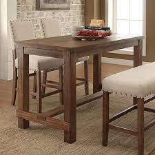 These pieces can be more practical for tall family members, add an interesting height variation to furnishings and also appear take up less space visually. Sania Cm3324pt Rustic Oak Rustic Counter Ht Table In 2021 Counter Height Dining Table Dining Table In Kitchen Solid Wood Dining Table