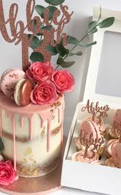 18th birthday cake with pink hombre, rose gold macarons, rose gold topper with fresh flowers 21st birthday cake with gold painted cake, fabric flowers, macaron and card topper square cua 1st birthday in north lakes. 18th Birthday Cake Luxury Drip Cakes Antonia S Cake Shop Merseyside