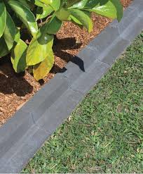 The right lawn edging can transform your yard by creating defined areas for mulch, flower beds, plants and shrubs. Our Lawn Edge Pavers Create A Crisp Polished Transition Between Your Garden Bed And Lawn Call Australi Garden Pavers Garden Lawn Edging Plastic Garden Edging