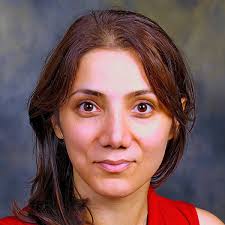 Non-Hermitian and Topological Photonics: Optics at an Exceptional Point