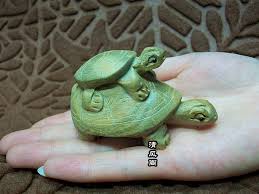 green sandalwood tortoise wood carving