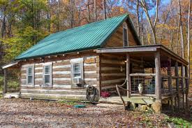 This large cabin has three levels, each with sleeping accommodations and a bathroom. 1800s Rustic Log Montana Cabin Near Hocking Hills Cabins For Rent In Nelsonville Ohio United States