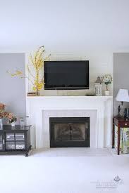 Hang your television on the mount above your fireplace. Wall Mount And A Way To Hide Those Cords Home Home Living Room Living Room Tv Wall