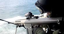 It comes with a 4x scope and is fairly accurate at long ranges. Barrett M82 Wikipedia