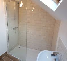 Attic Bathroom With Sloped Ceiling Cream Metro Wall Tiles And Wood Effect Floor Tile Low Profile Shower Tra Attic Shower Attic Bathroom Trendy Bathroom Tiles