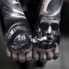 A tattoo that runs from the wrist down the fingers to the middle knuckle. Eye Tattoos For Men Hand Tattoos For Guys Eye Tattoo Tattoo Designs Men