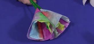Learn how to dye flowers with two colors and use this fun and educational activity for your 4th of july celebration. How To Make A Tie Dye Coffee Filter Flower Kids Activities Wonderhowto