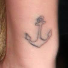 Miley cyrus' arm tattoo features the hindu religious symbol om, and is inked on the inside of her left wrist. Miley Cyrus Anchor Wrist Tattoo Steal Her Style