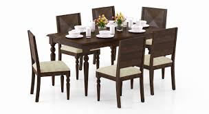 The right materials from a glass dining table that's modern and easy to clean to a sturdy wood kitchen table with bench that adds rustic flair, the right choice is the one. Dining Tables Upto 20 Off Buy Wooden Dining Table Sets Online Urban Ladder
