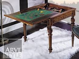 The impressive rudy dining and game table features a round reversible top for use as a dining or game table. Gaming Table With Interchangeable Top Idfdesign