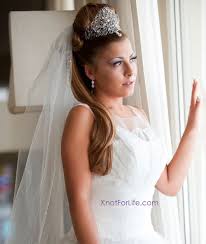 This braided style will be the crowning glory of your whole wedding day look. Long Wedding Hairstyles With Veils And Tiaras Knot For Life