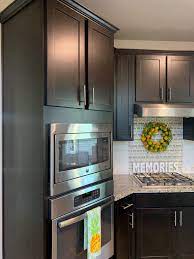 I've seen where a panel is just attached over the end, especially in overlay style, but these need to be. How To Clean Espresso Cabinets Pops Of Color Home