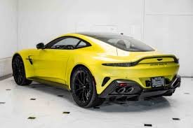 Image result for Sunburst Yellow 2017 Aston Martin