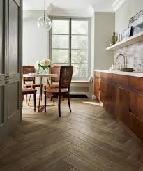 Give your floor an affordable makeover withgive your floor an affordable makeover with chaucer natural oak vinyl floor tile. Mora Tiles Topps Tiles