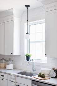 We did not find results for: Small White Glass And Bronze Vintage Light Over Kitchen Sink Transitional Kitchen
