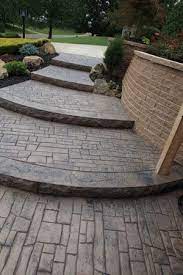 There are many steps involved in stamped concrete that must be executed carefully and quickly to. Klein S Lawn Landscaping Hardscapes Steps Concrete Patio Designs Concrete Walkway Stamped Concrete