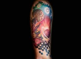 Colored universe tattoo on man left sleeve. 8 Universe Tattoos Designs