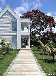The Exterior Was Painted In Resene Sea Fog The Rockcote Panels Helped Disguise The Witch S Hat Lo White Exterior Paint Exterior Color Schemes Exterior Paint
