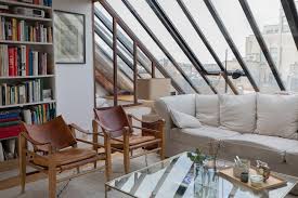 Matériel de suspension et gabarit. Attic Loft With Slanted Windows Offering Views Of Saint Germain Des Pres 6th Arrondissement Of Paris France Interiordesign