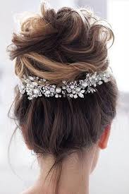Wedding Hairstyles For Medium Hair Updo Messy Volume High Bun On Dark Hair With A Silver Accessory Allbrid Messy Wedding Hair Long Hair Updo Medium Hair Styles
