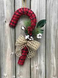 This Beautiful Buffalo Plaid Candy Cane Door Hanger Needs A New Home Based With Buffalo Plaid Ribbon And Toppe Canes Decor Candy Cane Wreath Christmas Wreaths