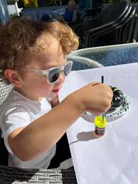 Pumpkin painting with glow in the dark paint and a black light to show it  off!