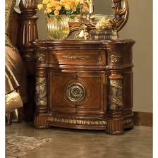 Beautifully crafted from birch solids with cherry, pecan, and elm burl veneers, the distinctive marquetry and intricate embellishments compliment. Michael Amini Villa Valencia Bedside Chest Nightstand By Aico