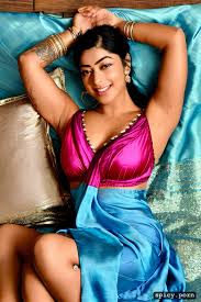 Image of lying on bed, wearing sleeveless transparent wet silk saree -  spicy.porn