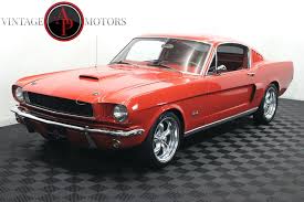 Image result for Poppy Red 1965 Mustang