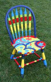 Once you have properly prepped up the surface of the chair, start applying the design you wished for in a solid color of your choice. The Passionate Maker Project Repainting A Kitchen Chair Painted Wooden Chairs Painting Old Chairs Painted Chairs