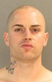 Man charged for wielding knife, sword